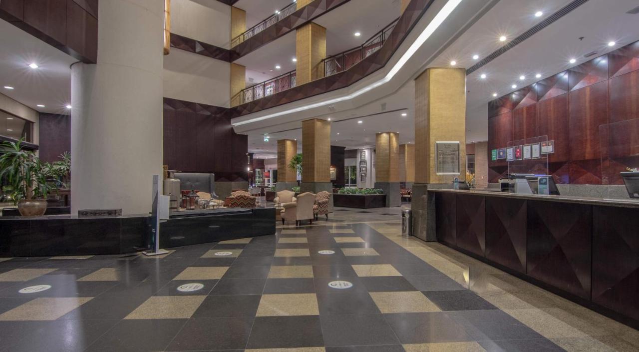 Hotel Deville Prime Porto Alegre Esterno foto Lobby