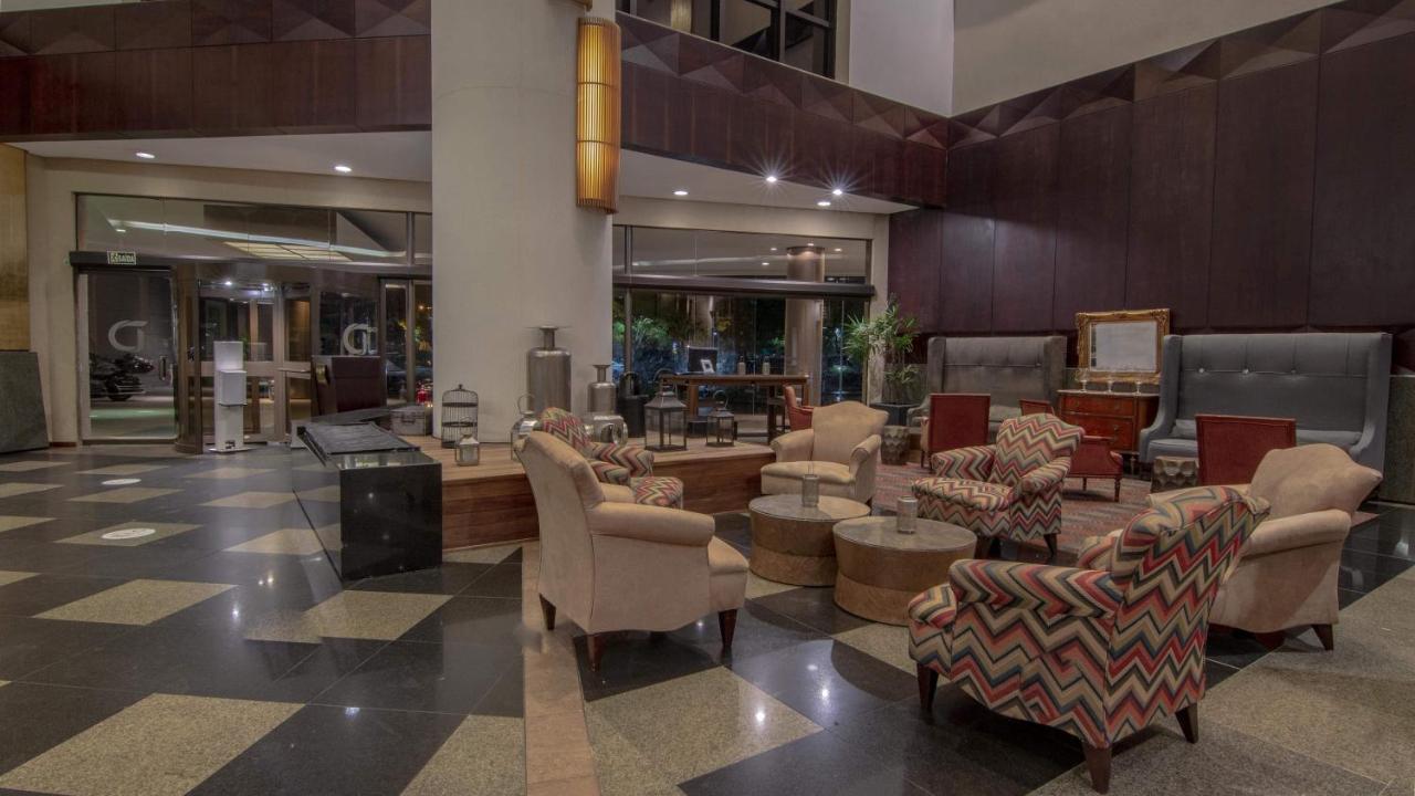 Hotel Deville Prime Porto Alegre Esterno foto Lobby