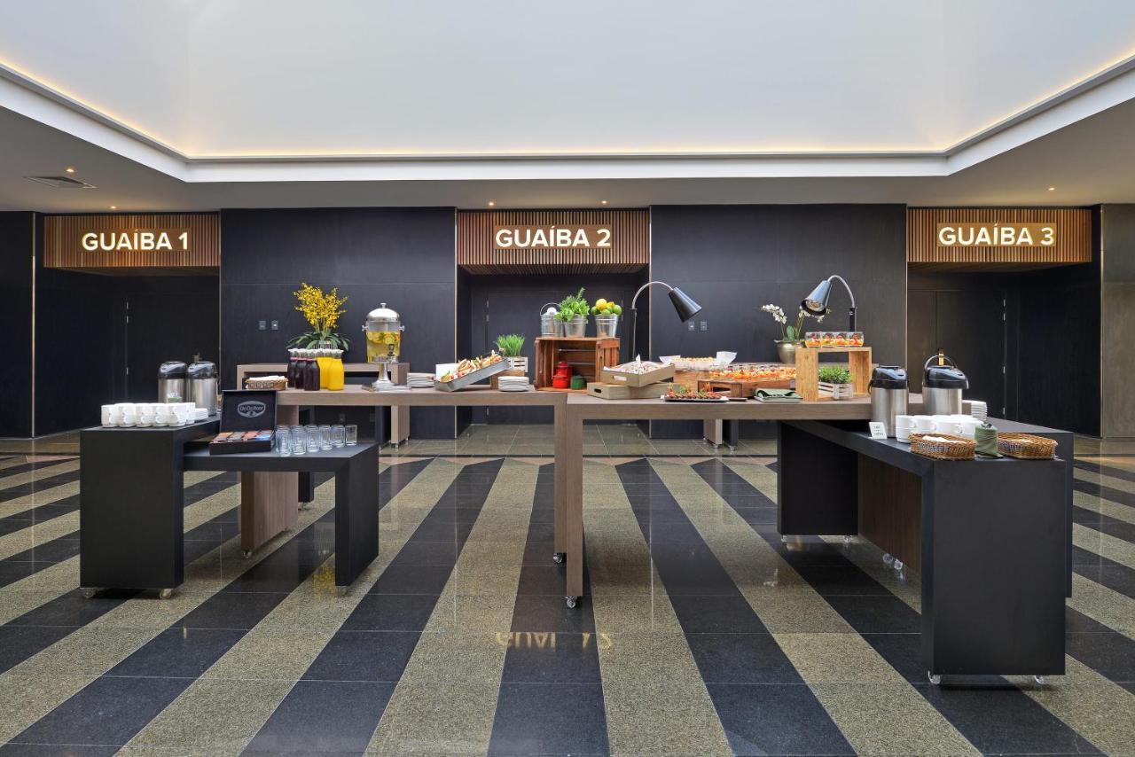Hotel Deville Prime Porto Alegre Esterno foto The buffet at the airport