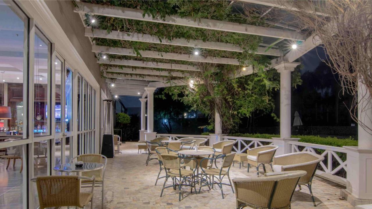 Hotel Deville Prime Porto Alegre Esterno foto The Pergola