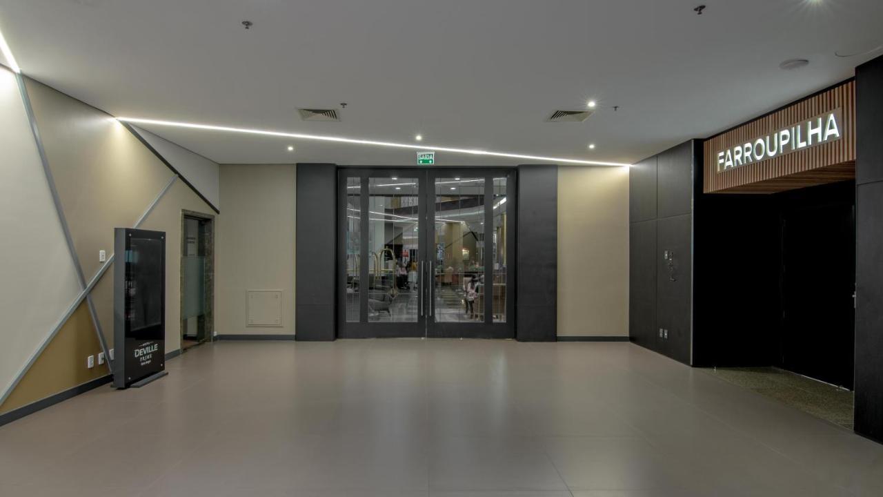 Hotel Deville Prime Porto Alegre Esterno foto Entrance to the Farrouk Lounge